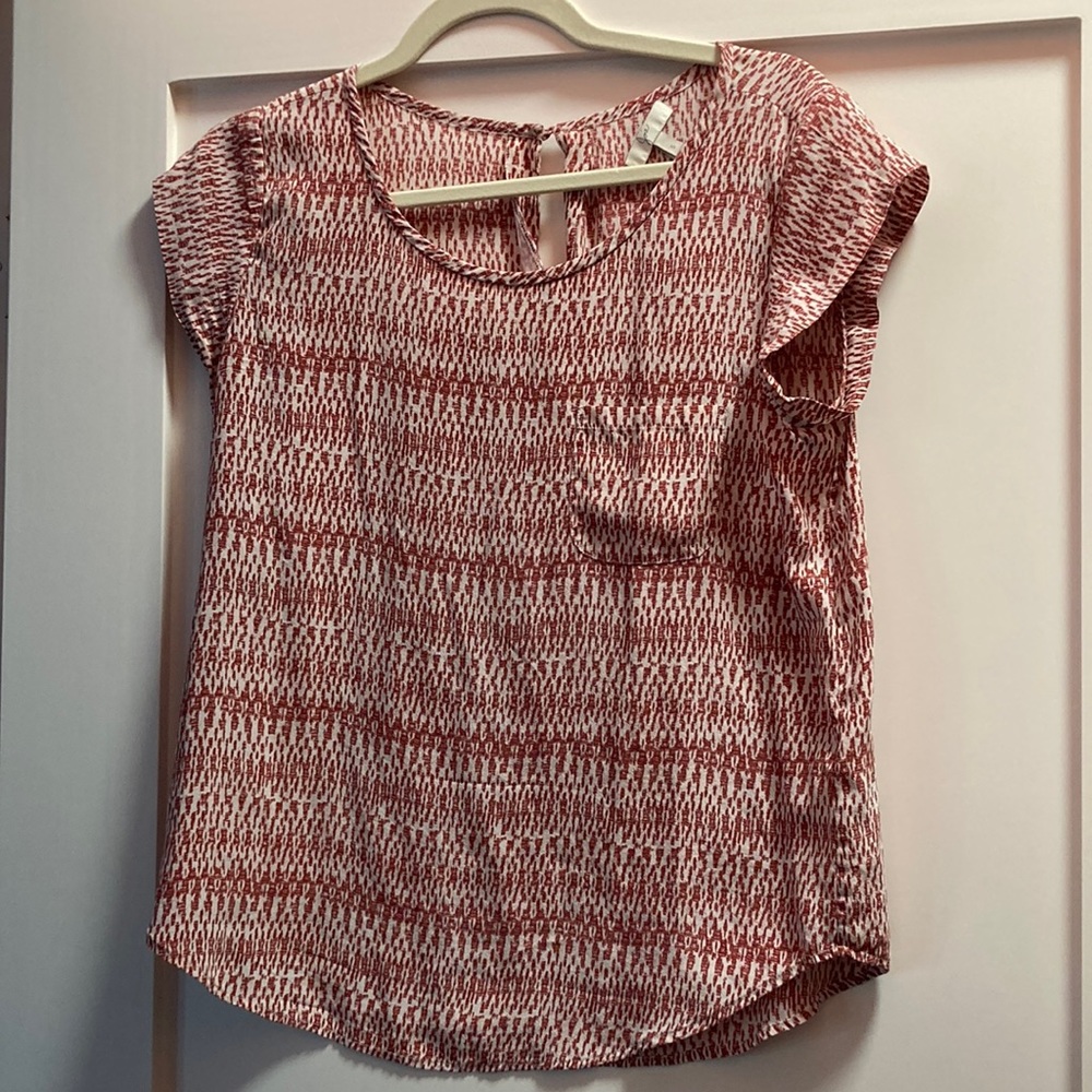 Red and white graphic print blouse